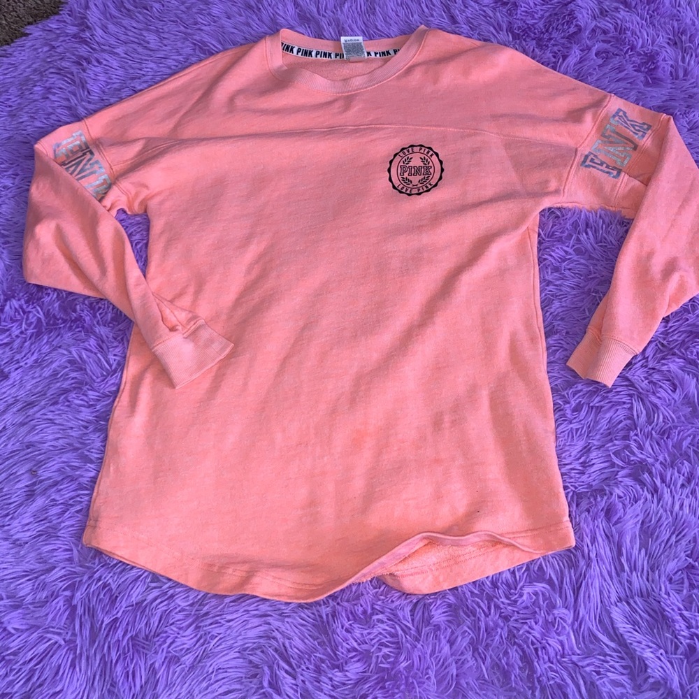Victoria’s Secret PINK long sleeve shirt. Coral color black lettering. Size XS